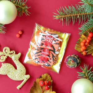 Целофановий пакетик «We wish a Merry Christmas/Різдвяний вінок» із золотою підкладкою та з клейкою стрічкою, 10*10 cм + 3 см